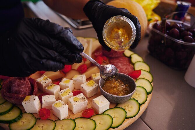 Chania Old Port All-inclusive Catamaran Cruise to Agioi Theodori - The Onboard Experience: Food, Drinks, and Fun