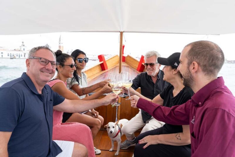 Check out Venice from a different angle: a scenic tour on a traditional boat. - Key Points