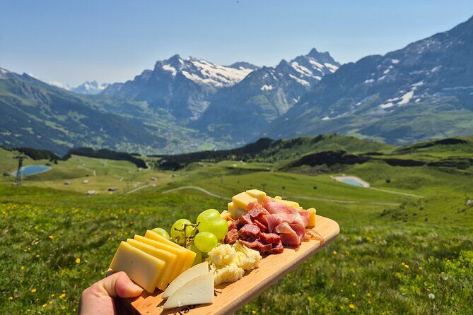 Cheese and chocolate on mountain summit - Key Points