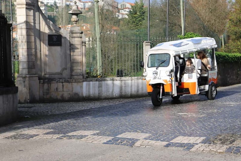 Coimbra: TukTuk Adventure. Local and multilingual host. Hotel pickup. - Key Points