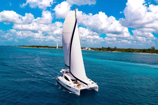 Cozumel Luxury Sailing & Snorkeling with Lunch and Open Bar Onboard - Key Points