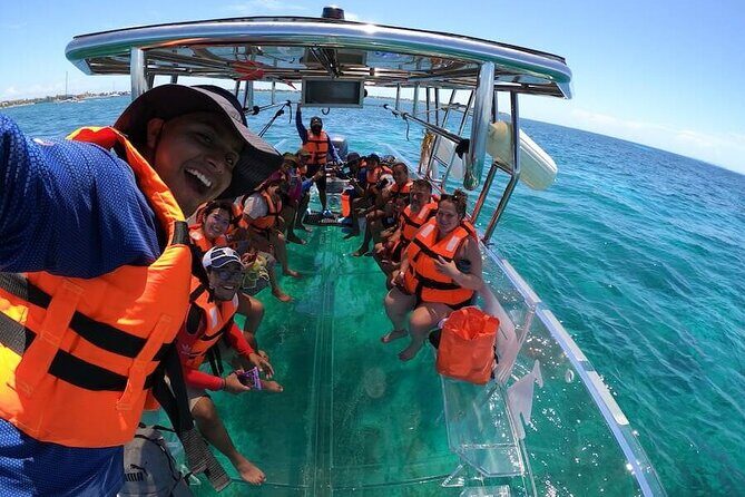 Crystal Boat Tour to Isla Mujeres and Reefs - Key Points