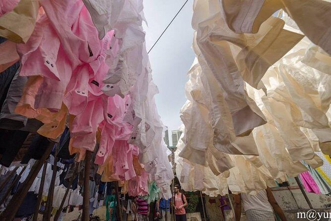 Dabbawala, Dhobi Ghat & Dharavi slum Tour with Local Train Ride - FAQs