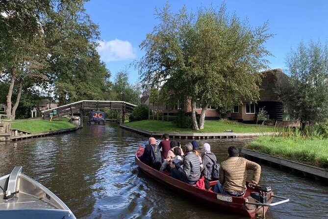 Day Tour Giethoorn, Afsluitdijk and Zaanse Schans with Boat Cruise - Transport, Timing, and Group Size