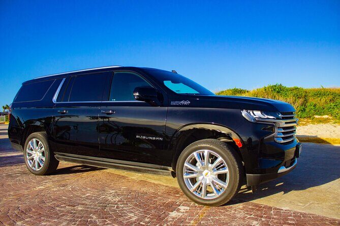 Departure by Luxury Suv from Puerto Morelos to Cancun Airport - Key Points