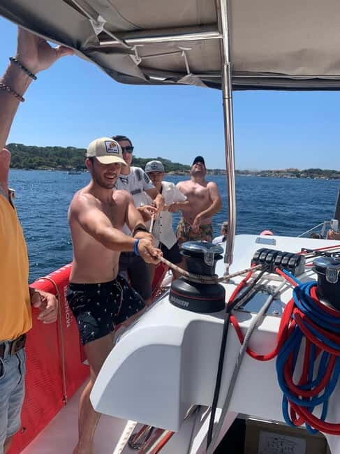 Departure from BRUSC: Half-day catamaran cruise - The Sum Up