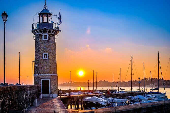 Desenzano Sunset Walking and Boat Tour with a Drink On Board - Key Points