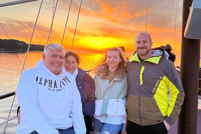 Dolphin Watching & Sunset Boat Tour With Dinner and Drinks - Key Points