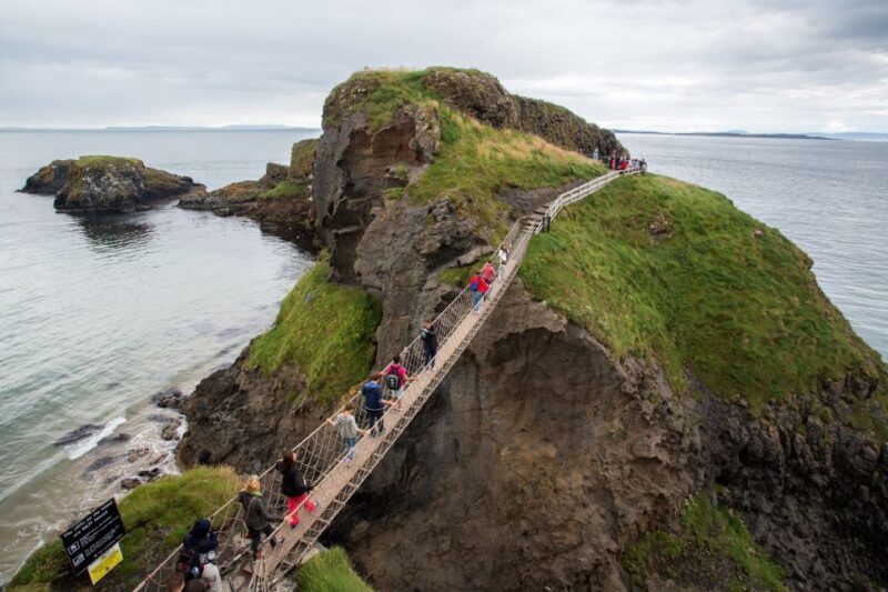 Dublin: Giant's Causeway & Glens of Antrim Day Tour - Dunluce Castle and the Bushmills Distillery