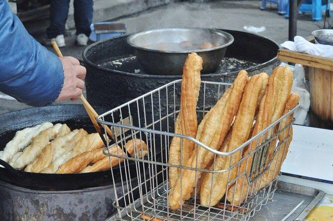 Early Bird Shanghai Street Breakfast Tour And Visit Fabric Market - What the Tour Entails: A Step-by-Step Breakdown