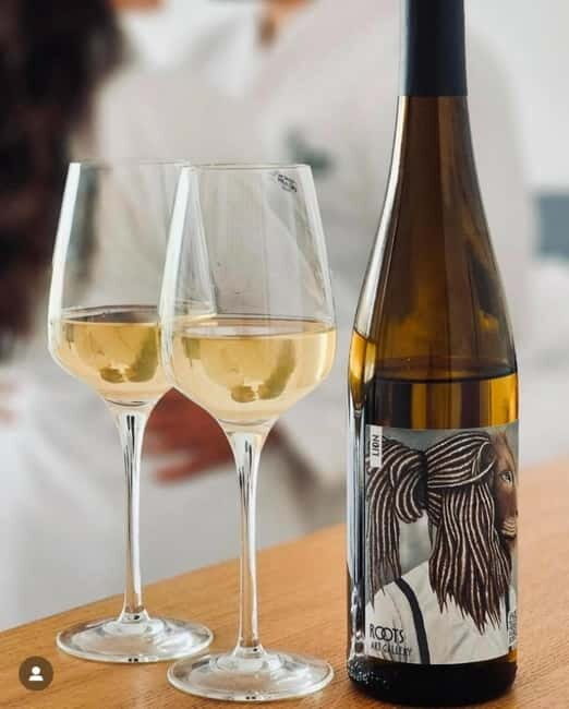 Entrance to the Roots Gallery + 1 glass of wine with snacks + 1 fine art print - Why This Tour Offers Good Value