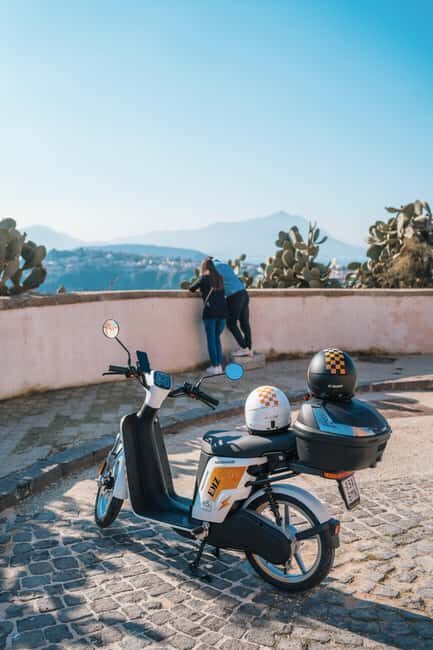 Explore Procida on an Electric Scooter: Daily Rental with All the Perks - The Sum Up