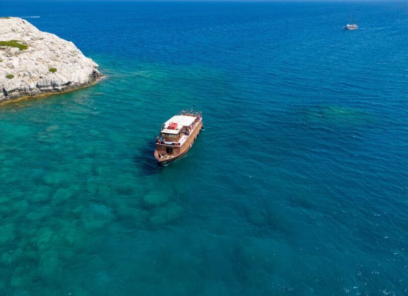Faliraki : Transfer & Cruise to Lindos with 3 Swimming Stops - Authenticity & Experience