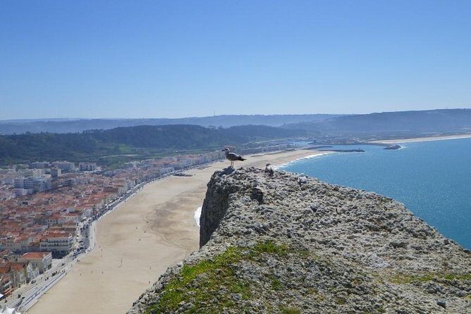 Fátima  Batalha  Nazaré  Óbidos: FAITH, HISTORY, AND BEAUTY - Exploring Portugal’s Heart: Faith, History, and Stunning Scenery in a Single Day