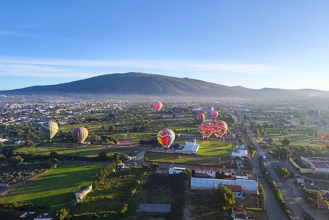 Flight in Teotihuacan Hot Air Balloon with Transportation and Breakfast - Key Points