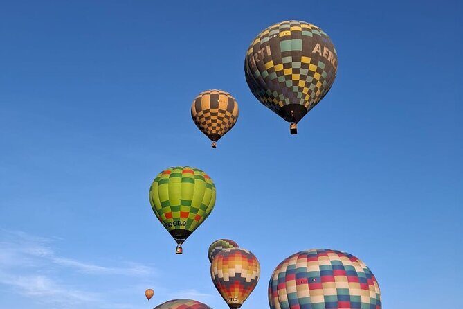 Flight in Teotihuacan Hot Air Balloon with Transportation and Breakfast - Cultural Insights: Pulque and Obsidian