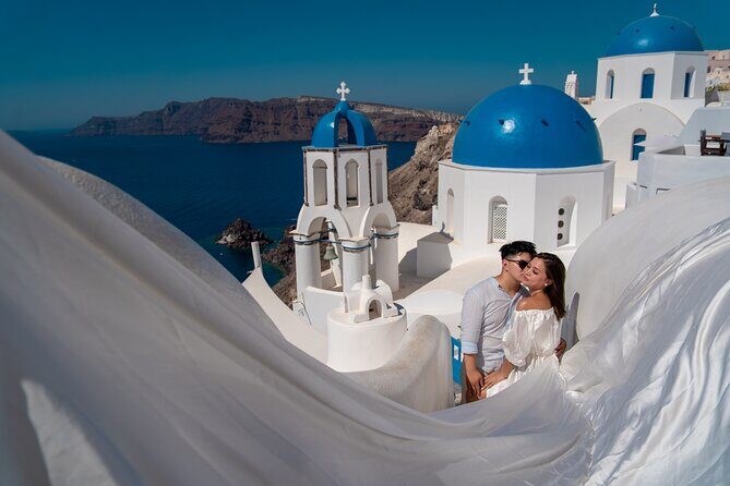 Flying Dress Photoshoot in Oia Private entry to Blue Dome - The Sum Up