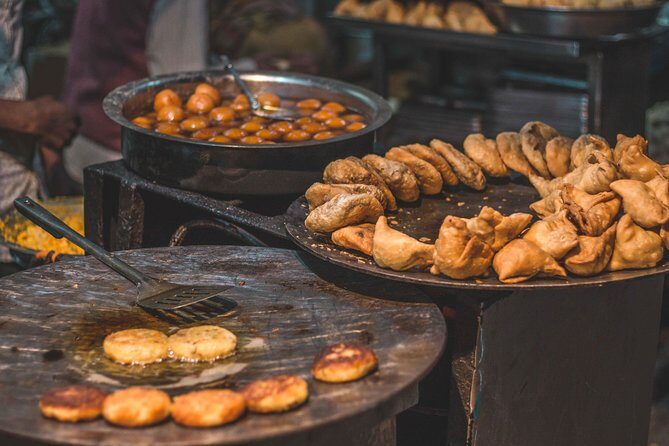 Food Walk tour of Old & New Delhi with a local guide - What You’ll Eat & Experience