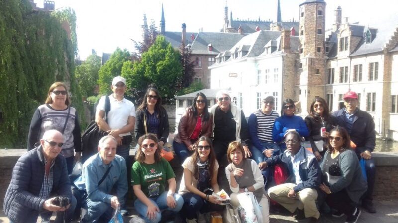 From Amsterdam: Day Trip to Bruges in Spanish or English - Authentic Experiences and Highlights