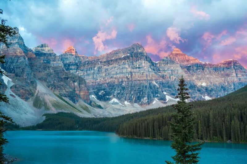 From Banff: Sunrise Moraine & Louise Premium Guided Tour - Lake Louise: The Lake Before the Crowds