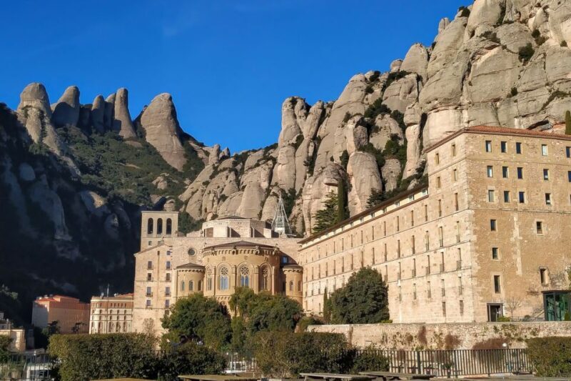 From Barcelona: Montserrat Mountain Hike and Monastery Tour - Key Points