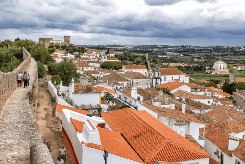 From Lisbon: Medieval Óbidos & Nazaré Coastal Charm Day Trip - Key Points