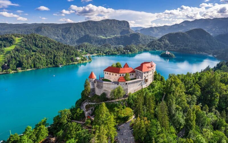 From Ljubljana: Postojna Cave, Predjama Castle and Lake Bled - A Deep Dive into the Experience