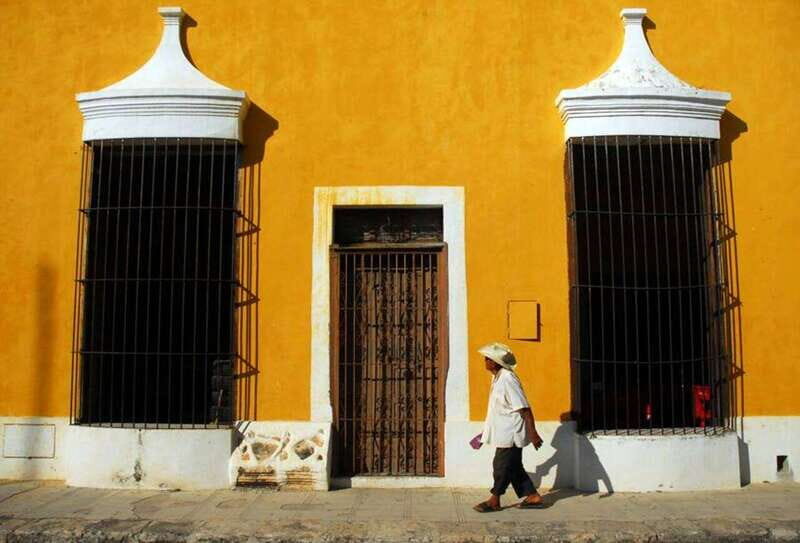 From Merida: Izamal and Valladolid Guide Tour & Yucatan Meal - Key Points