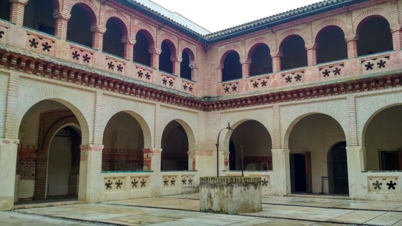 From Seville: Italica Roman City & Medieval Monastery Tour - Key Points