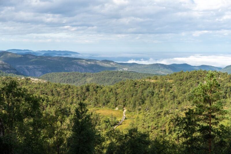From Stavanger: Pulpit Rock Guided Hike with Pickup - The Descent and Return