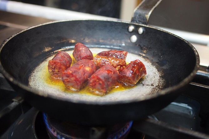 From the market, to the secret kitchen - Sports and Social Time: Playing Handball & Sampling Tapas