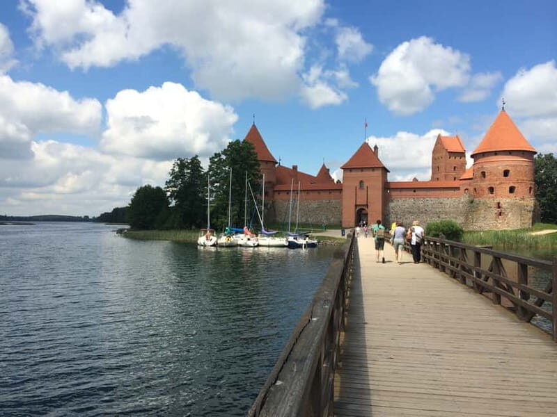 From Vilnius: Trakai Castle and Paneriai Memorial Tour - Authentic Experiences and Highlights