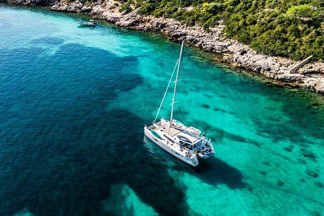 Full day catamaran tour in Alghero - Key Points: