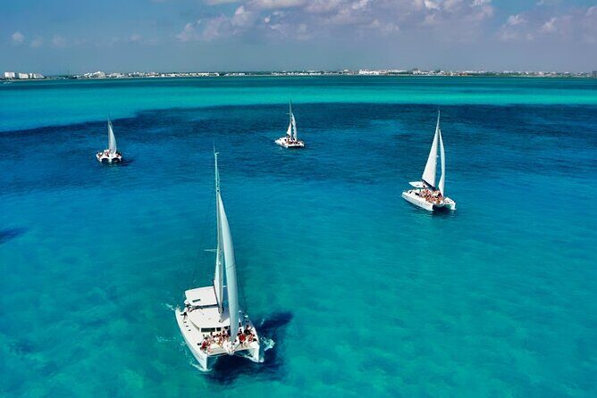 Full-Day Isla Mujeres Catamaran Cruise with Snorkeling & Beach Club - Key Points