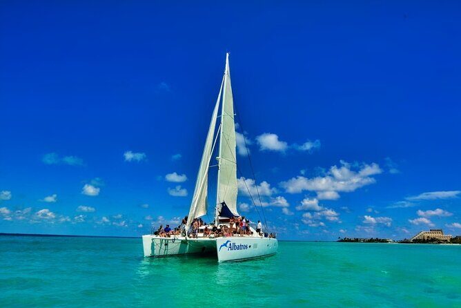 Full-Day Isla Mujeres Catamaran Cruise with Snorkeling & Beach Club - The Sum Up