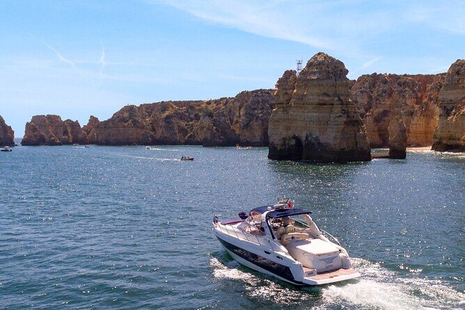 Full day private yacht from lagos with drinks, tapas, paddle boards and kayak - Discovering the Full-Day Yacht Experience from Lagos