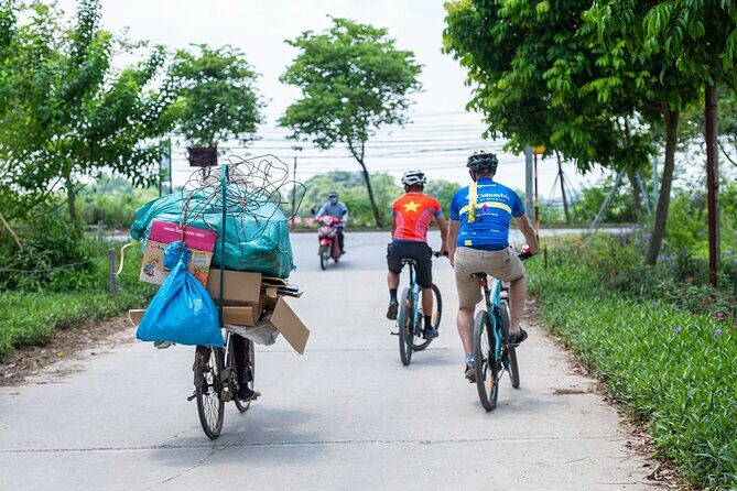 Full-Day Red River Bike Tour from Hanoi with Lunch and Pickup - Explore Vietnam through the Red River Bike Tour from Hanoi