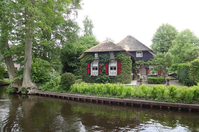 Giethoorn and Zaanse Schans Day Tour with Small Boat Ride - Free Time & Final Moments
