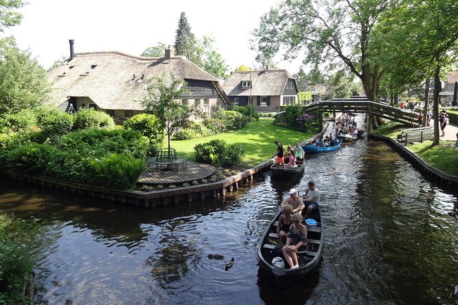 Giethoorn Day Tour from Amsterdam with Small Boat Ride - The Sum Up