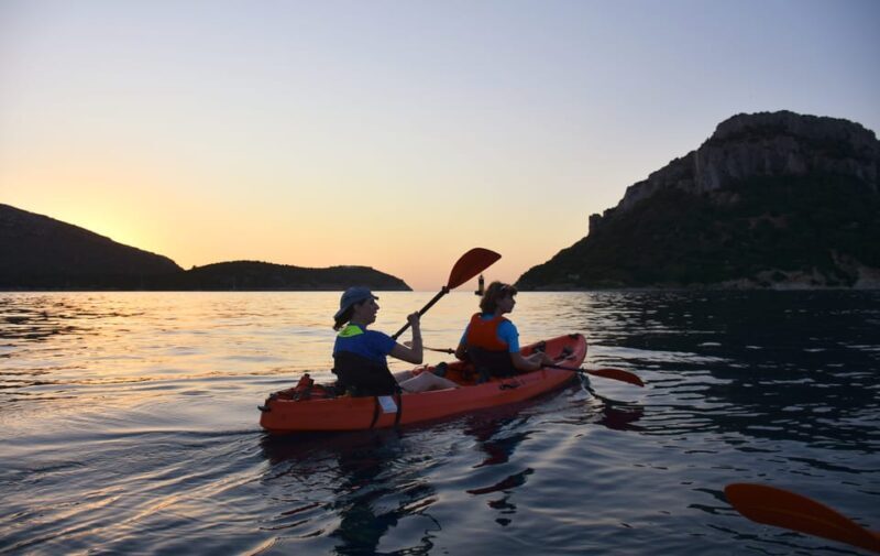 Golfo Aranci: Sunrise Dolphin Kayak Tour with Breakfast - Snorkeling and Beach Stops
