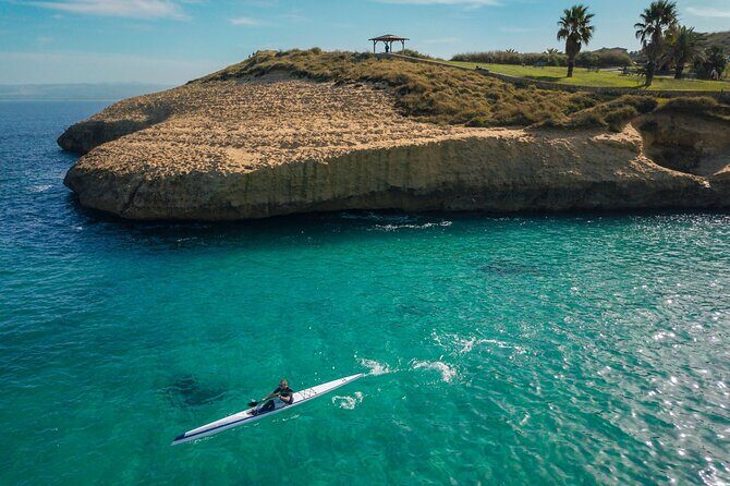 Guided Kayaking Excursion in Porto Torres - Who Should Book This Experience?