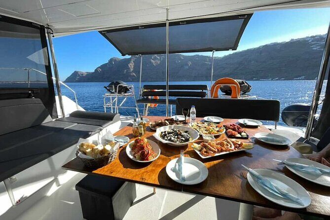 Half Day Premium Catamaran Cruise in Santorini including Oia - Key Points