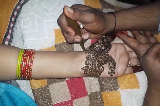 Henna application session with dinner - The Sum Up