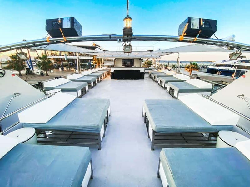 Ibiza: VIP Catamaran Party with DJ, Open Bar, Paella, and Nightclubs - Key Points