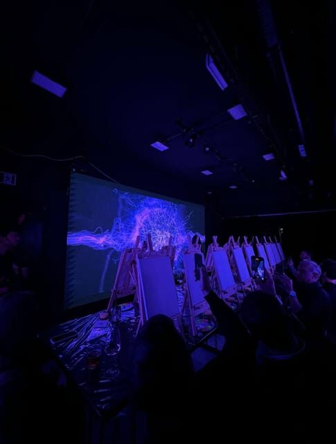 Immersive art experience with unlimited wine - Key Points