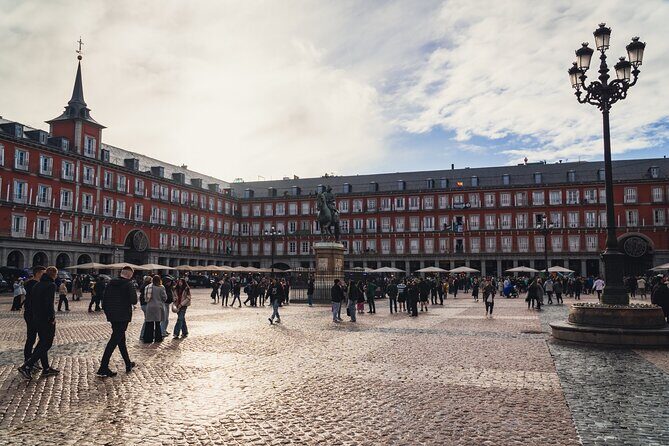 Imperial Madrid Private Journey through the Austrias - Starting at Puerta del Sol: The City’s Vibrant Pulse