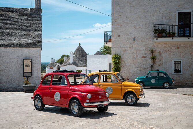 In Valle d'Itria on a vintage Fiat 500. Photo Quest Tour - Authenticity & Experience Highlights