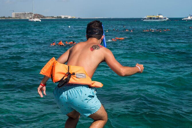 Isla Mujeres Catamaran tour with Open Bar, Lunch and Snorkeling - Practical Tips for Travelers