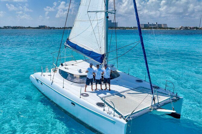 Isla Mujeres Catamaran Tour with Optional Pick-Up & Beach Club - Key Points