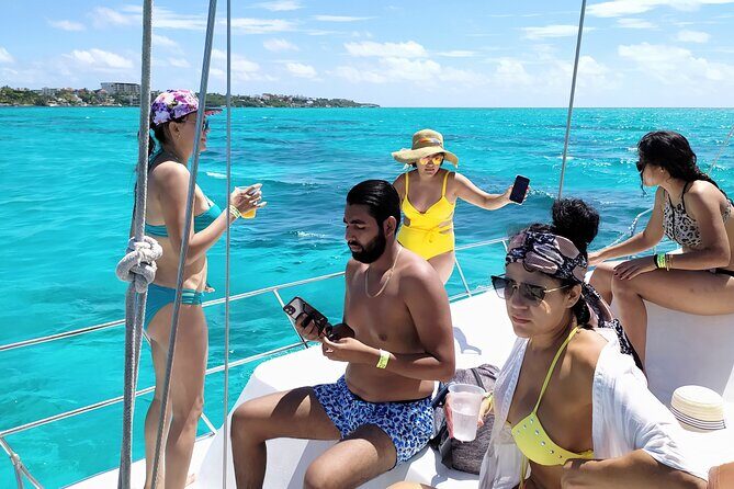 Isla Mujeres Catamaran Tour with Snorkeling at MUSA, Buffet Lunch & Open Bar - Key Points